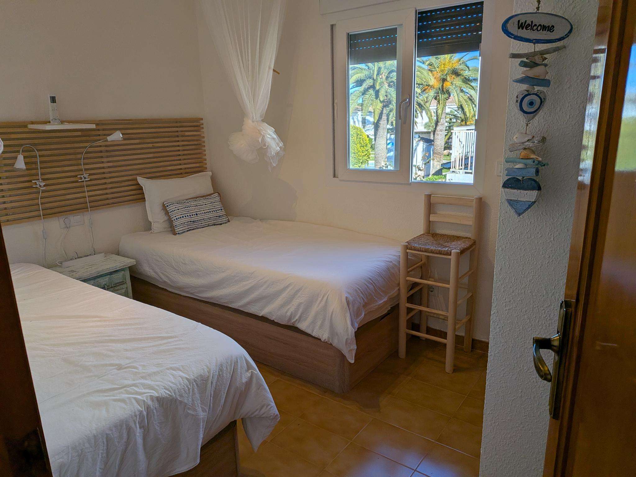 Second bedroom with two single beds